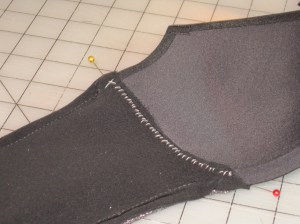 Whip stitch the bands to the underwire and cup on both sides